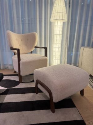 White accent wool chair with leg rest